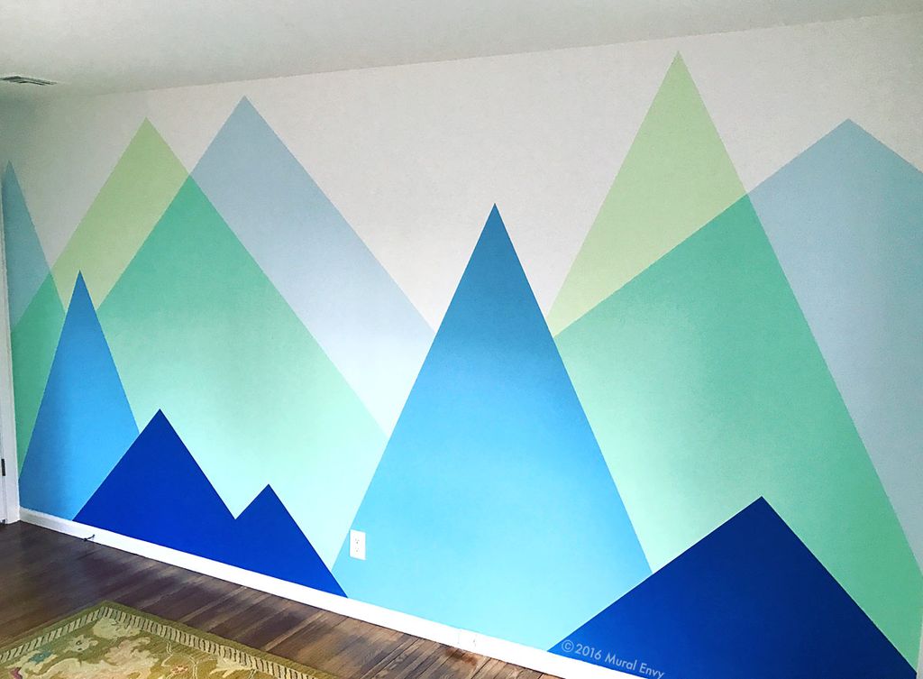 Stylized mountain mural for baby's nursery.