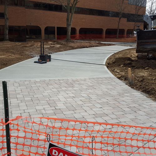 Concrete with Pavers.... We can give you both!