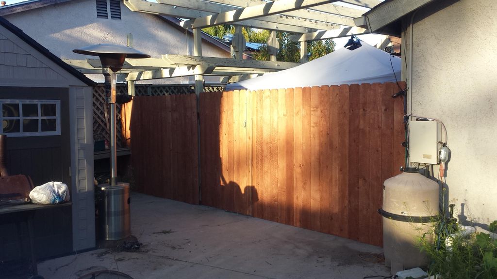 New fence and gate installed to add privacy and re