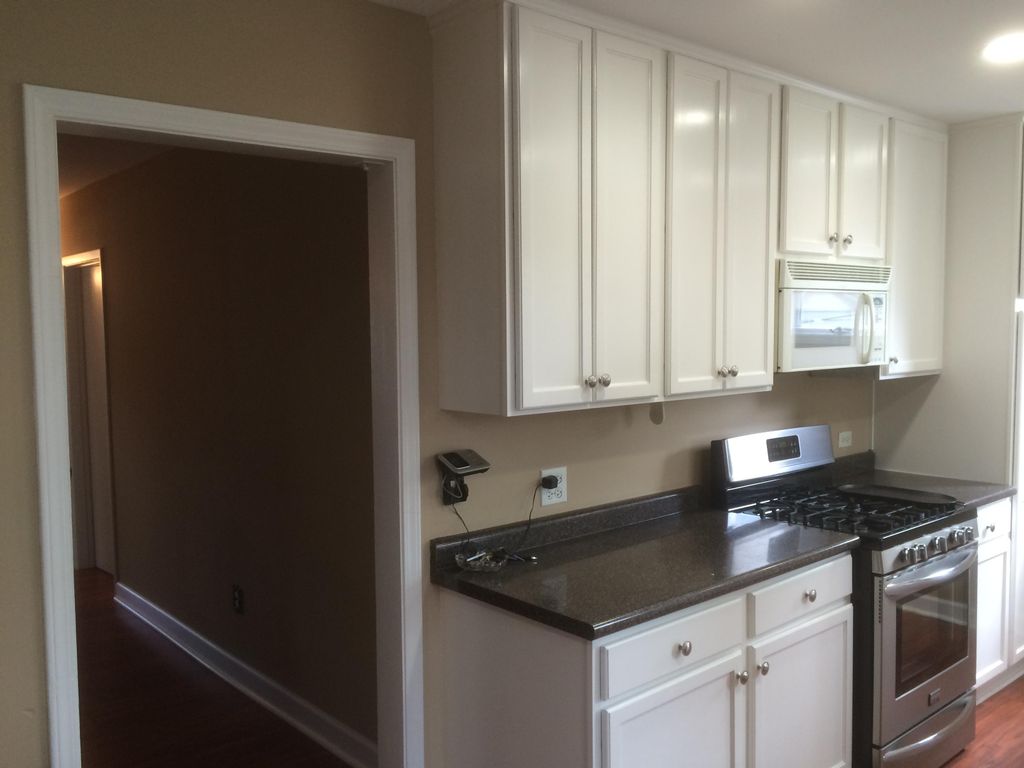 painting of cabinets, trim, walls and drywall exis