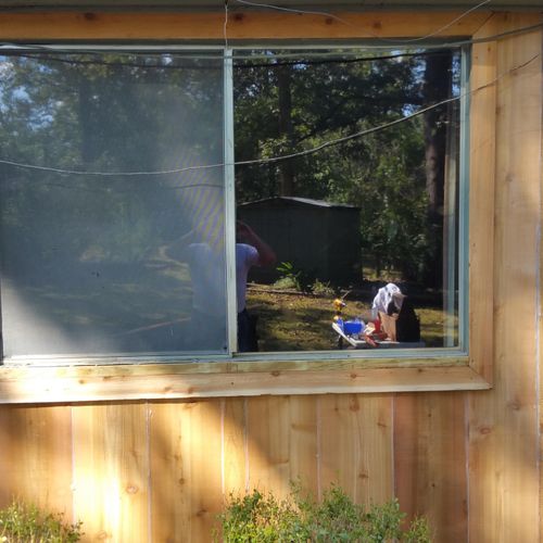 Build a new cedar wall for a bay window for Sarah,
