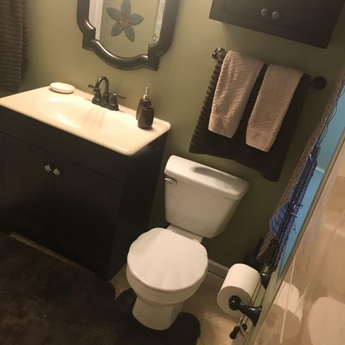 complete bathroom remodel. new vanity, mirror, fau