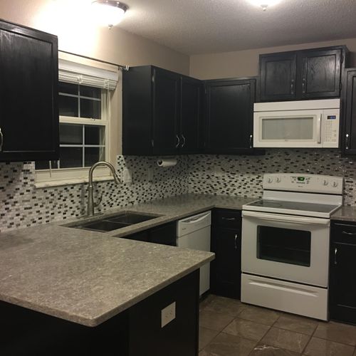 Kitchen remodel - cabinet painting and installatio