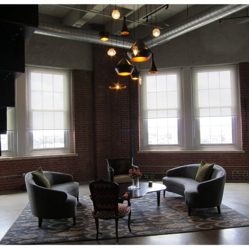 Residential loft with custom lighting, upholstery 
