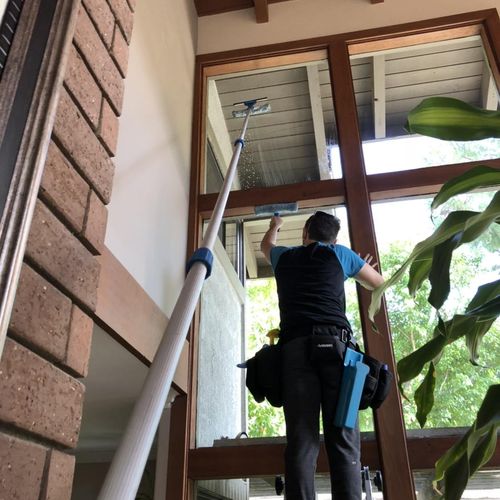 Window cleaning high interior windows with extensi