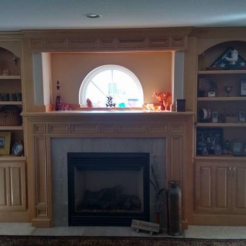 Custom mantel with book cases and window
