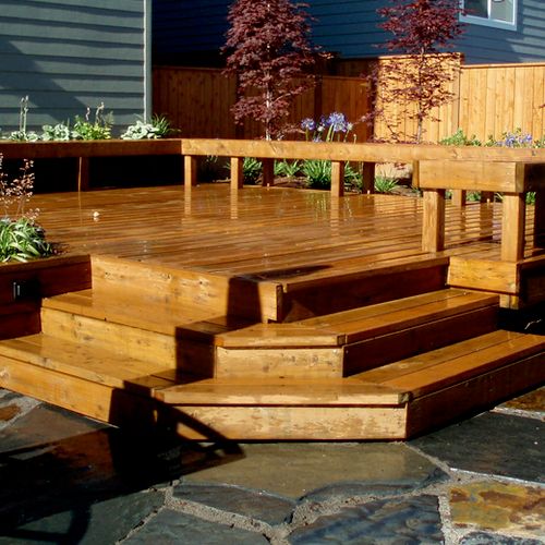 Cedar deck with built in planter boxes and seating