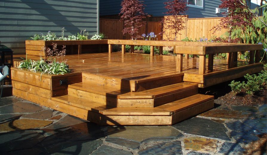Cedar deck with built in planter boxes and seating