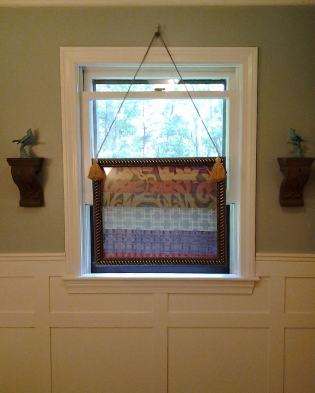 Wainscoted Bathroom with Fabric Framed Window Trea