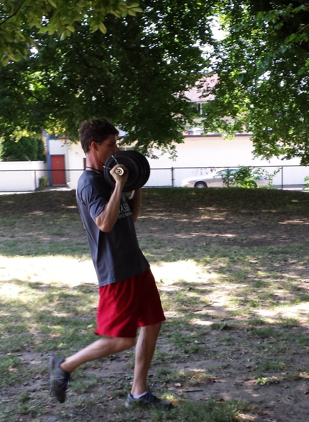 Weighted carries with a 60 lbs dumbbell.