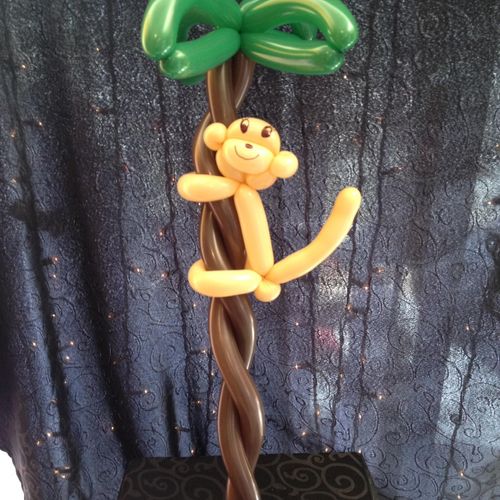 Classic monkey in a palm tree.