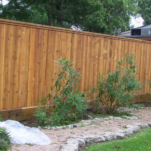 7Ft tall cedar fence with cedar cap and trim