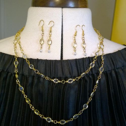 18' and 22" silver around clear gems and dangle ea