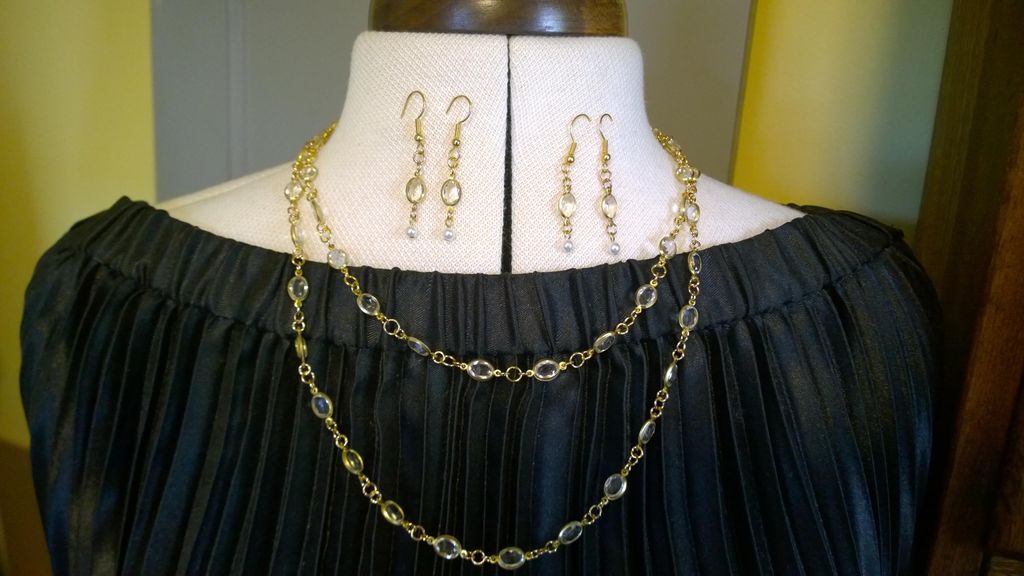 18' and 22" silver around clear gems and dangle ea