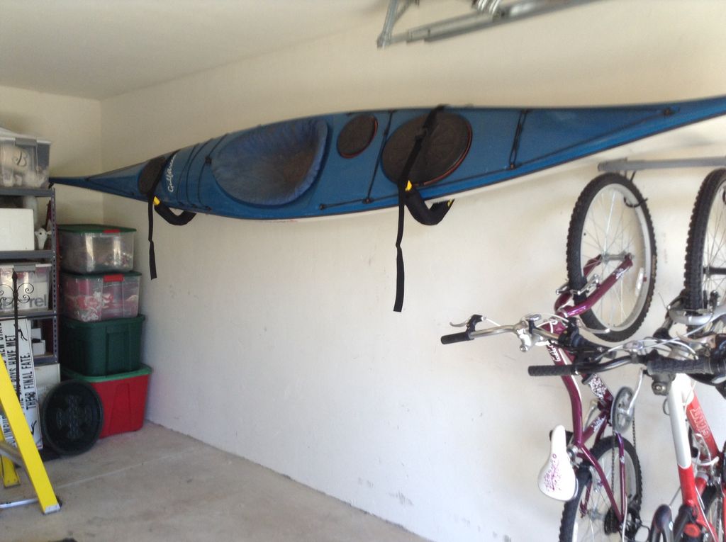 Installed Kayak & bicycle rack on interior concret