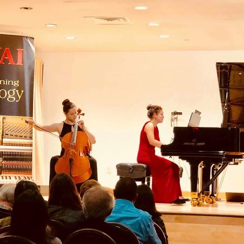 Performing with pianist Maria Gorodetskaya at the 