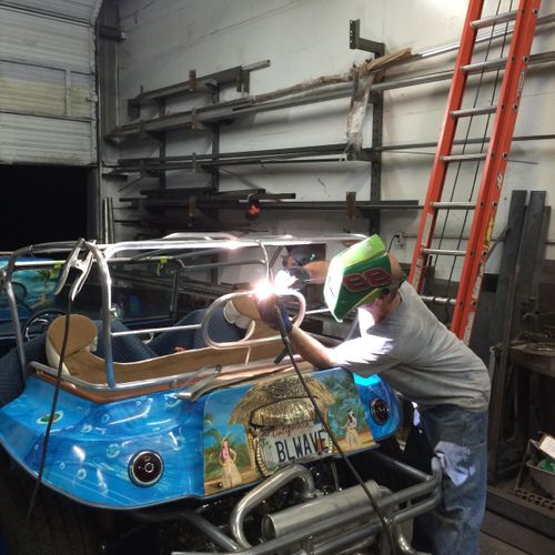 me welding on custom top for dune buggy
