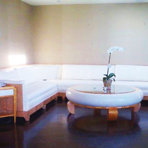 Custom corner sofa, circular coffee table and corn