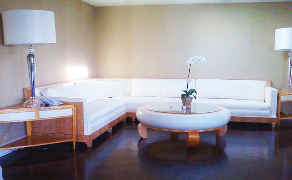 Custom corner sofa, circular coffee table and corn