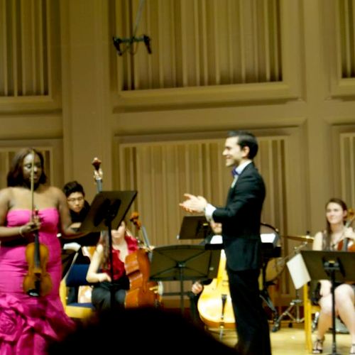 Soloist with conductor Jose Augustin Sanchez in Ol