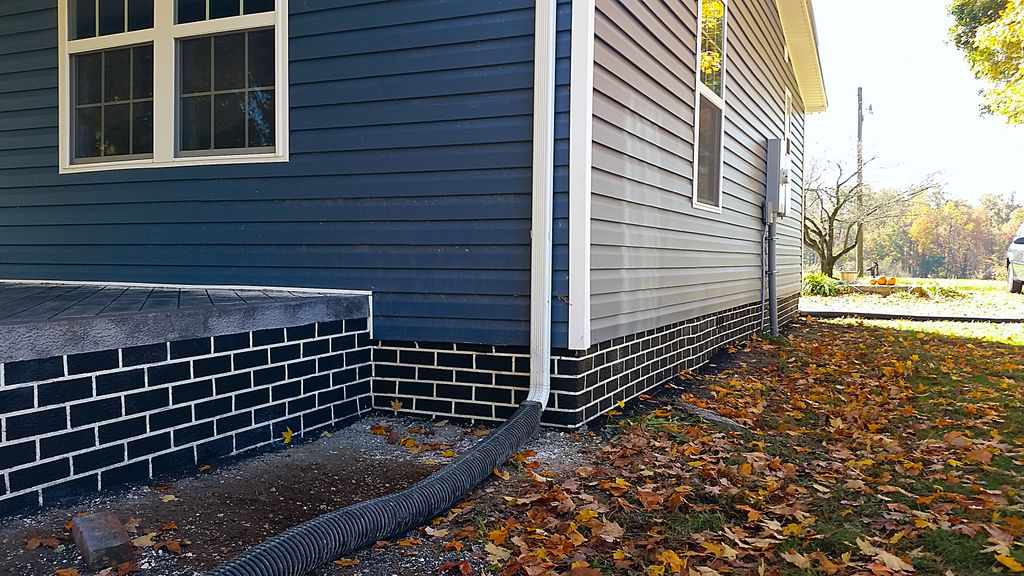 We overlaid the foundation in black brick and the 