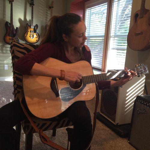 Nicole learning to play Bob Dylan's "Girl From Nor