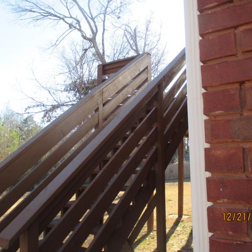 Reporting an improper handrail on a deck.