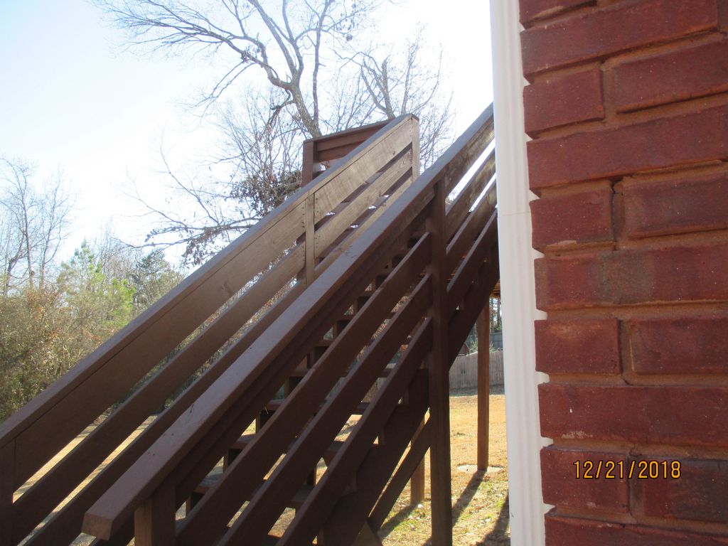 Reporting an improper handrail on a deck.