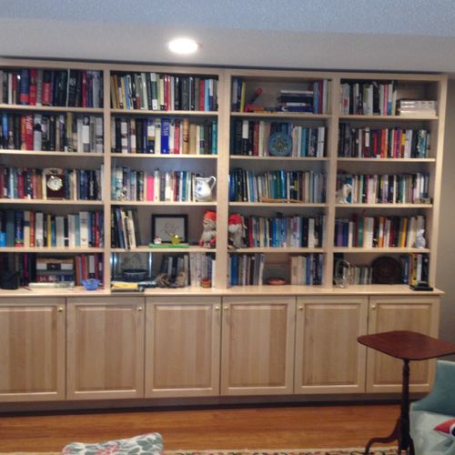 Custom bookcase in basement level. Coordinated siz