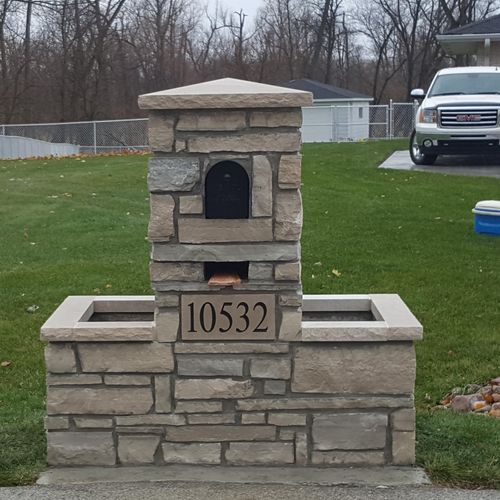 Custom stone mailbox.