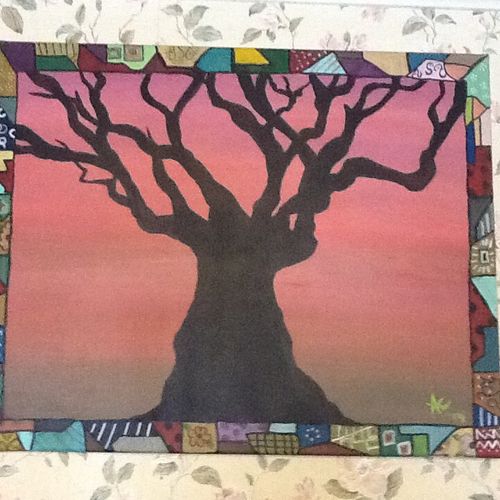 a patchwork framed silhouette of a tree