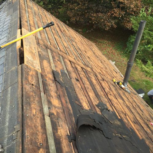 This leaky roof was in rough shape. Some repairs a