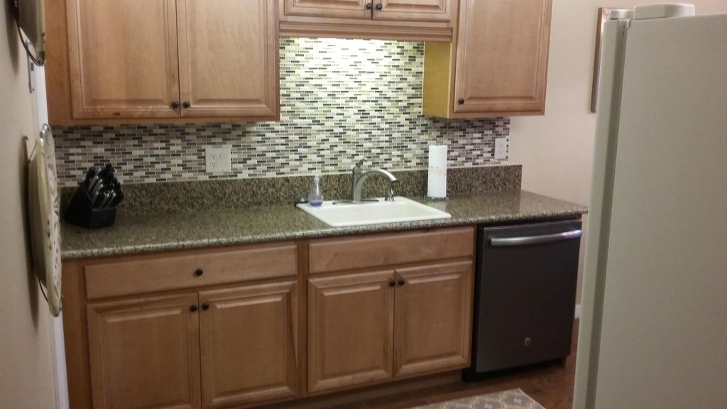 New kitchen cabinets, floor, lighting upgrade and 
