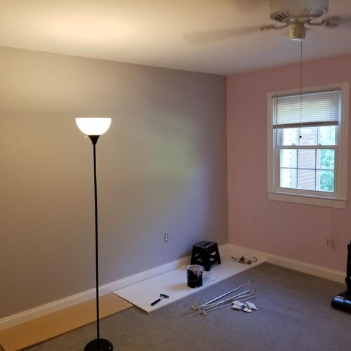 room painted from dark green to pink with grey acc