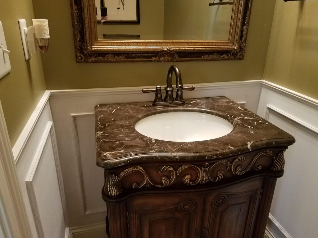 Wainscote in a small half bath in West Chester. Pi