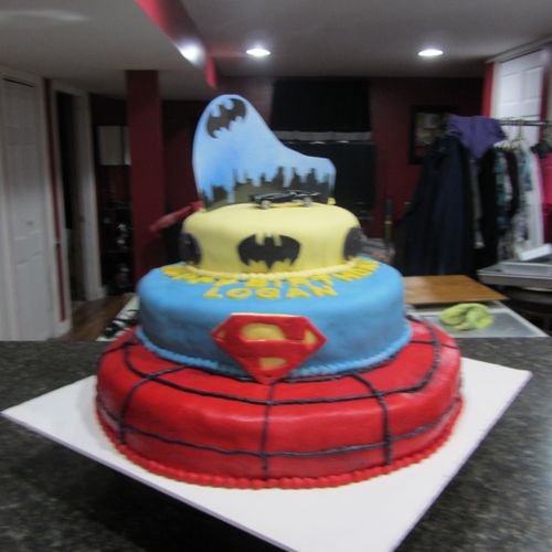 Spiderman Superman Batman Cake covered in fondant 