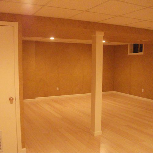 A basic basement finish with hand textured walls, 