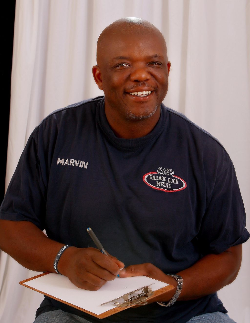 Marvin Milton/Overhead garage door solutions speci