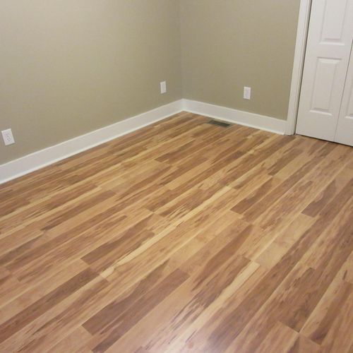 After (Bedroom Laminate Flooring/ Trim)