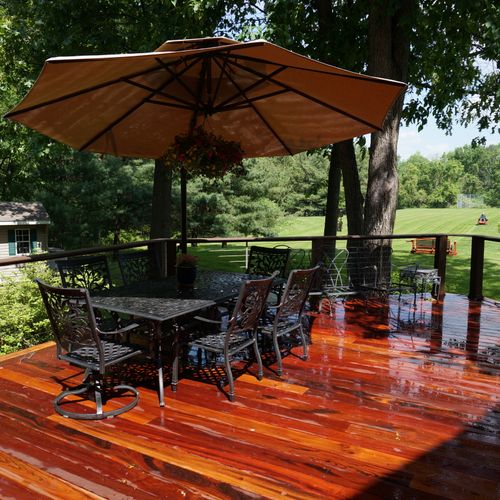Custom Tiger Wood deck with cable rail hand rails