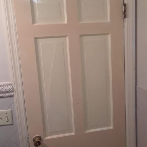 Brown door repaired and painted