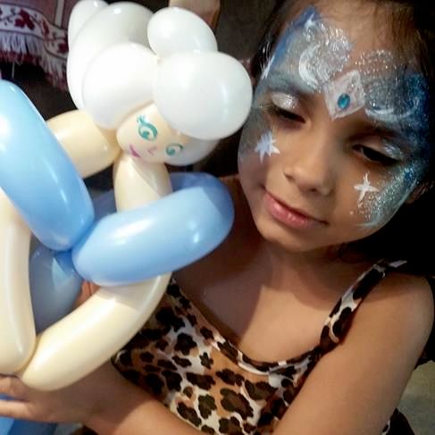 Frozen! Elsa face paint and Elsa balloon.