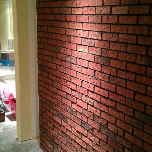 Brick veneer installed on complete basement job!