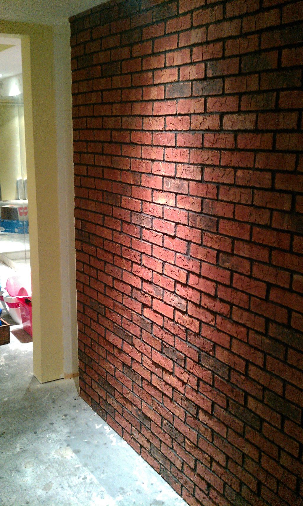 Brick veneer installed on complete basement job!