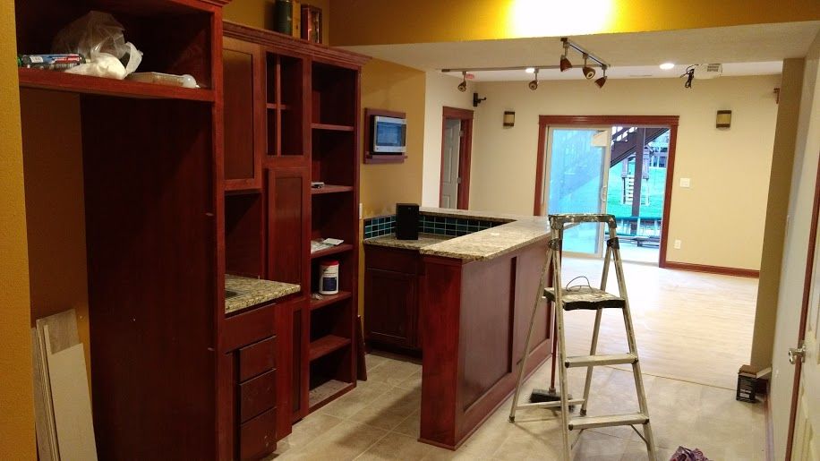 Basement Finish Rescue. Backside of bar with glass