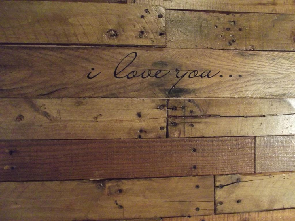 Reclaimed lumber to create a head board.