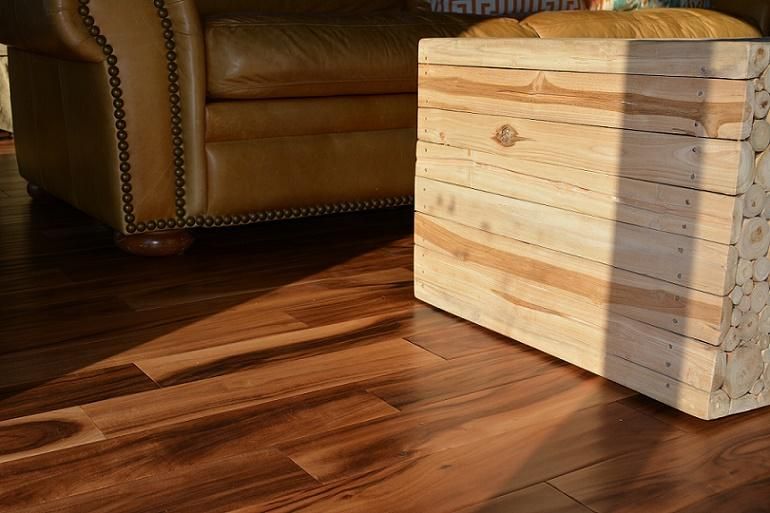 Handscraped engineered Acacia gives these homeowne