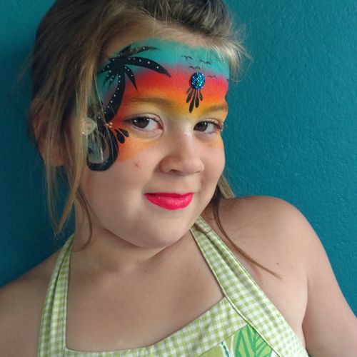 My daughter Piper with a Caribbean face painting.