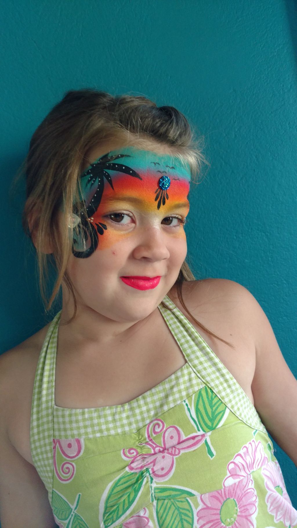 My daughter Piper with a Caribbean face painting.