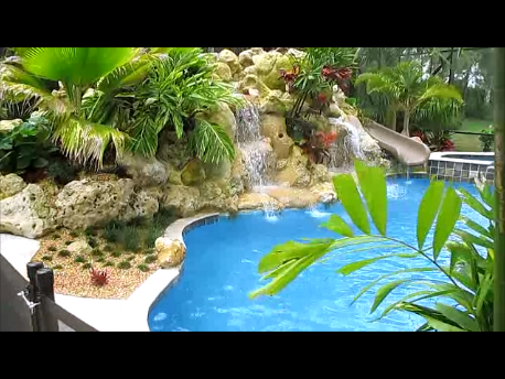 Real rock waterfall & slide for a swimming pool. B